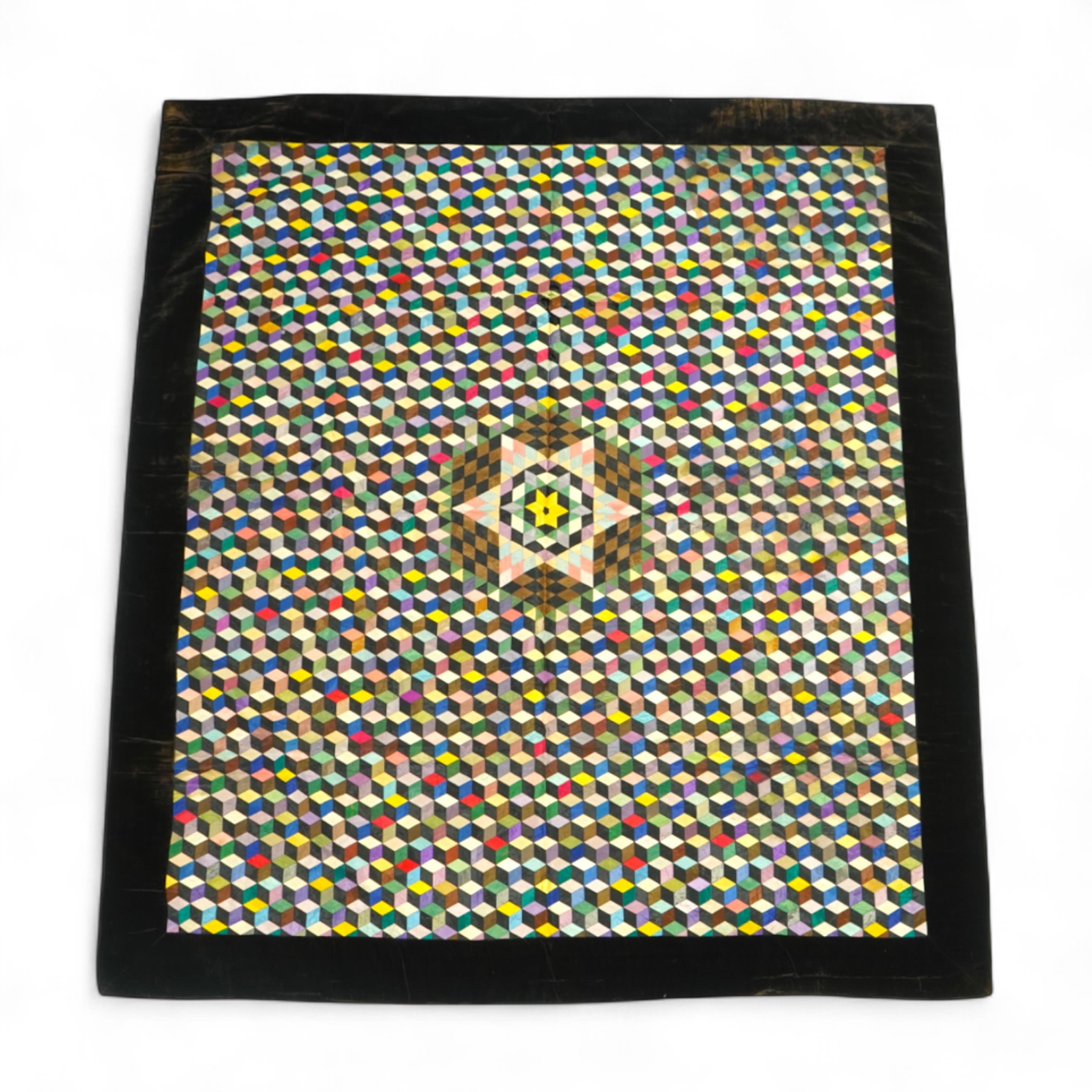 An English 19th century silk ‘Tumbling Blocks’, hand sewn, patchwork quilt, with central star motif and wide velvet border. Worked with multi coloured silks backed with black and blue silk., 170cm x 152cm. Condition - th